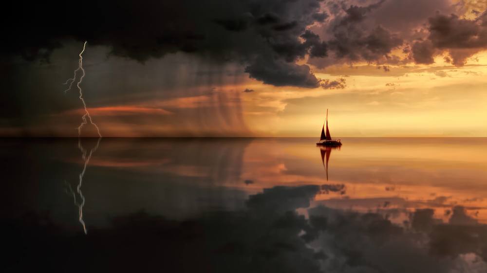 backlit-boat-clouds-1118874